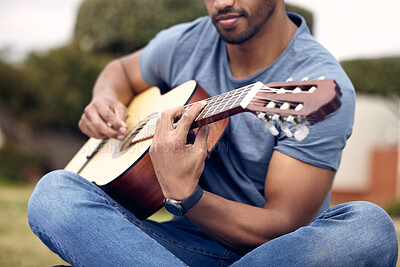 Buy stock photo Man, hands and guitar in garden for music, sound and performance in nature. Male person, musician and playing instrument in backyard for practice, production and rehearsal for college talent show