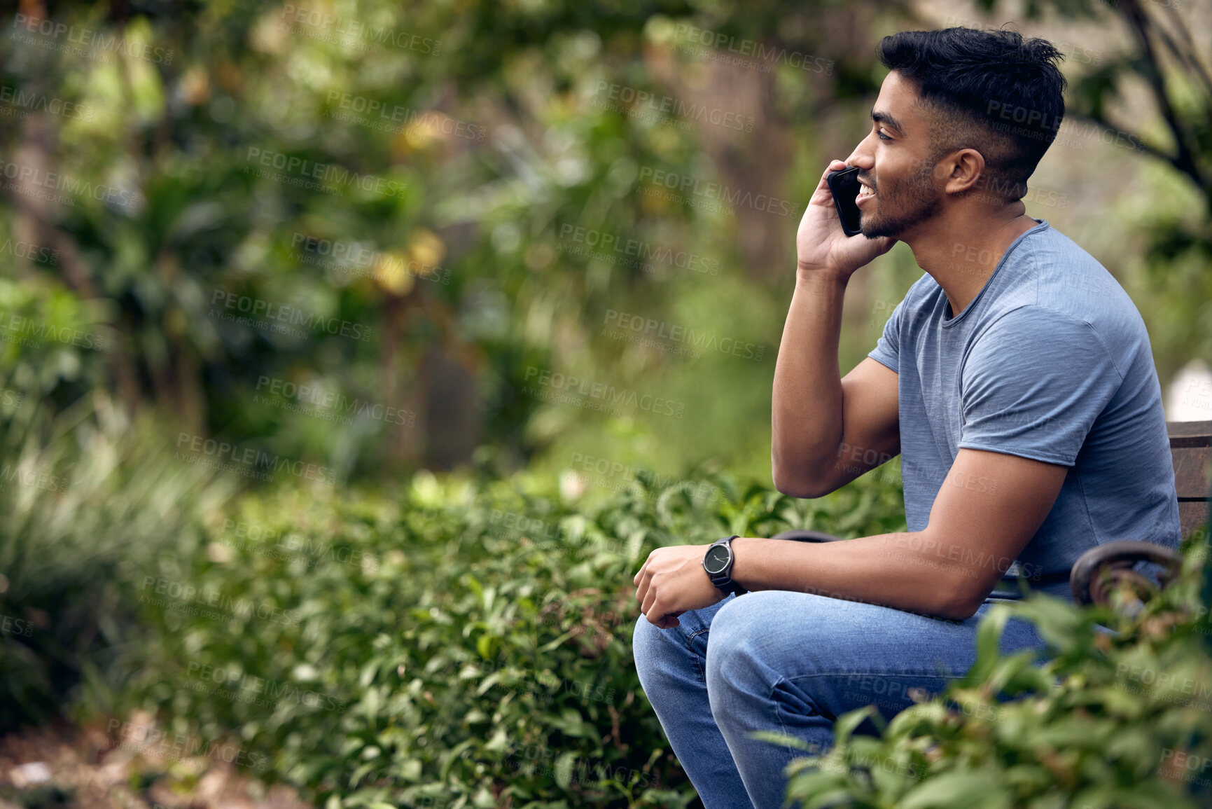 Buy stock photo Phone call, man and college student in park, outdoor and talking with connection to contact and chat. University, education and person in campus with mobile, speaking and check for update in studying