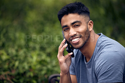 Buy stock photo Phone call, man and university student in park, outdoor and smile with connection to contact and talking. College, education and person in campus with mobile, speaking and check for update in school