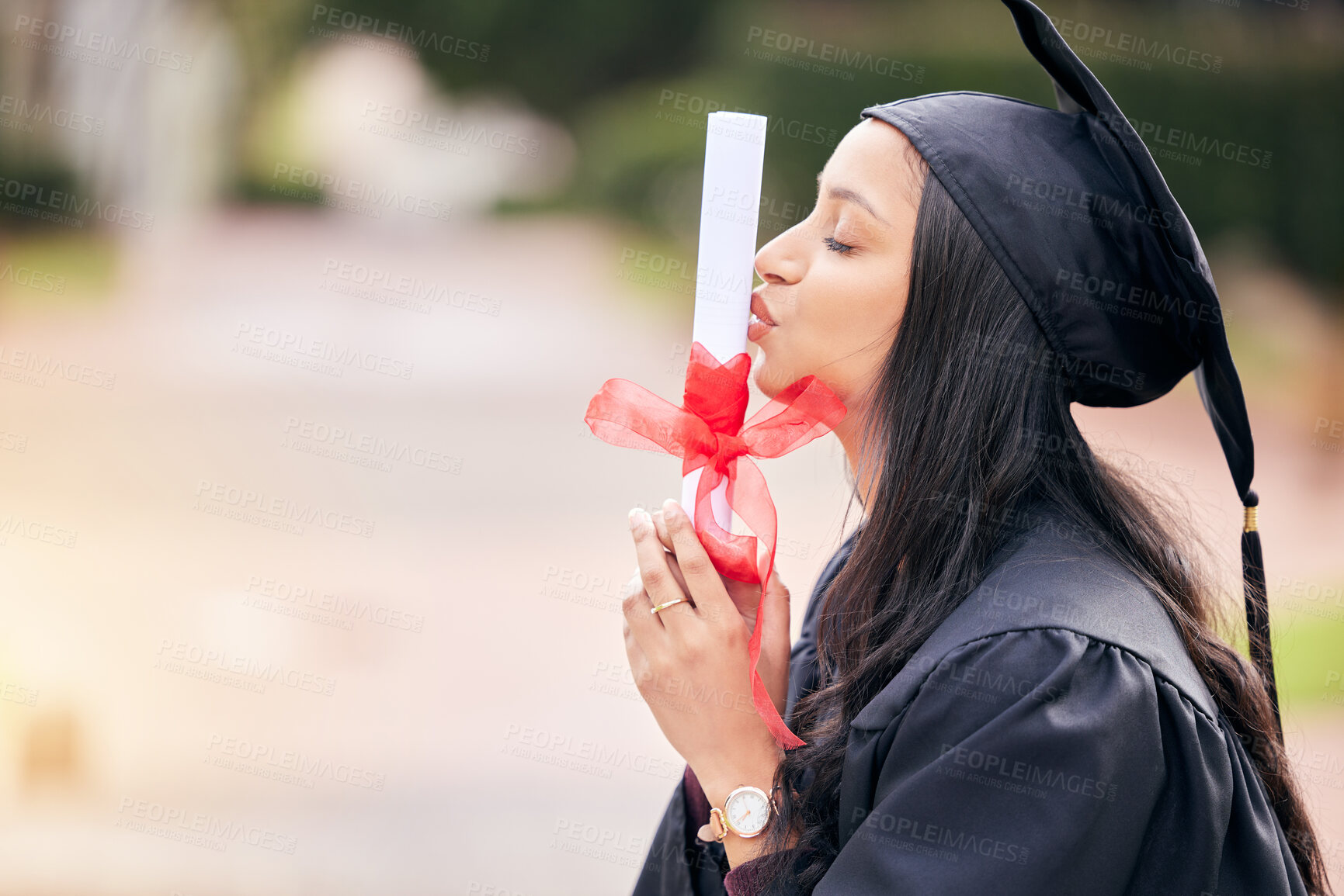 Buy stock photo Kiss, diploma and student at graduation in celebration of college, education and achievement. Study, certificate and girl with pride for university degree, success and gratitude for scholarship