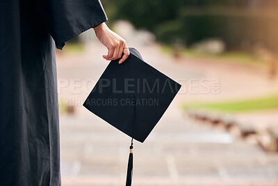 Buy stock photo Cropped shot of an unrecognizable young female student celebrating on graduation day