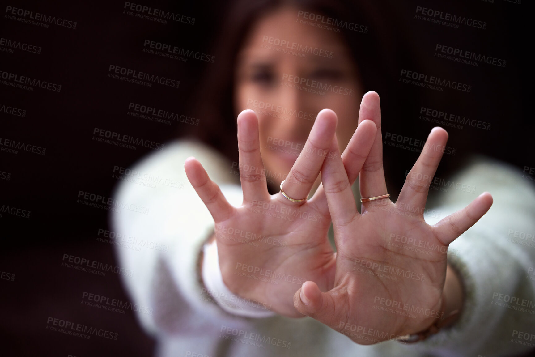 Buy stock photo Face, fear and woman with hands to stop domestic violence, sexual harassment or crime in studio. Pain, anxiety and scared girl in fight for gender abuse, danger and crying on black background.