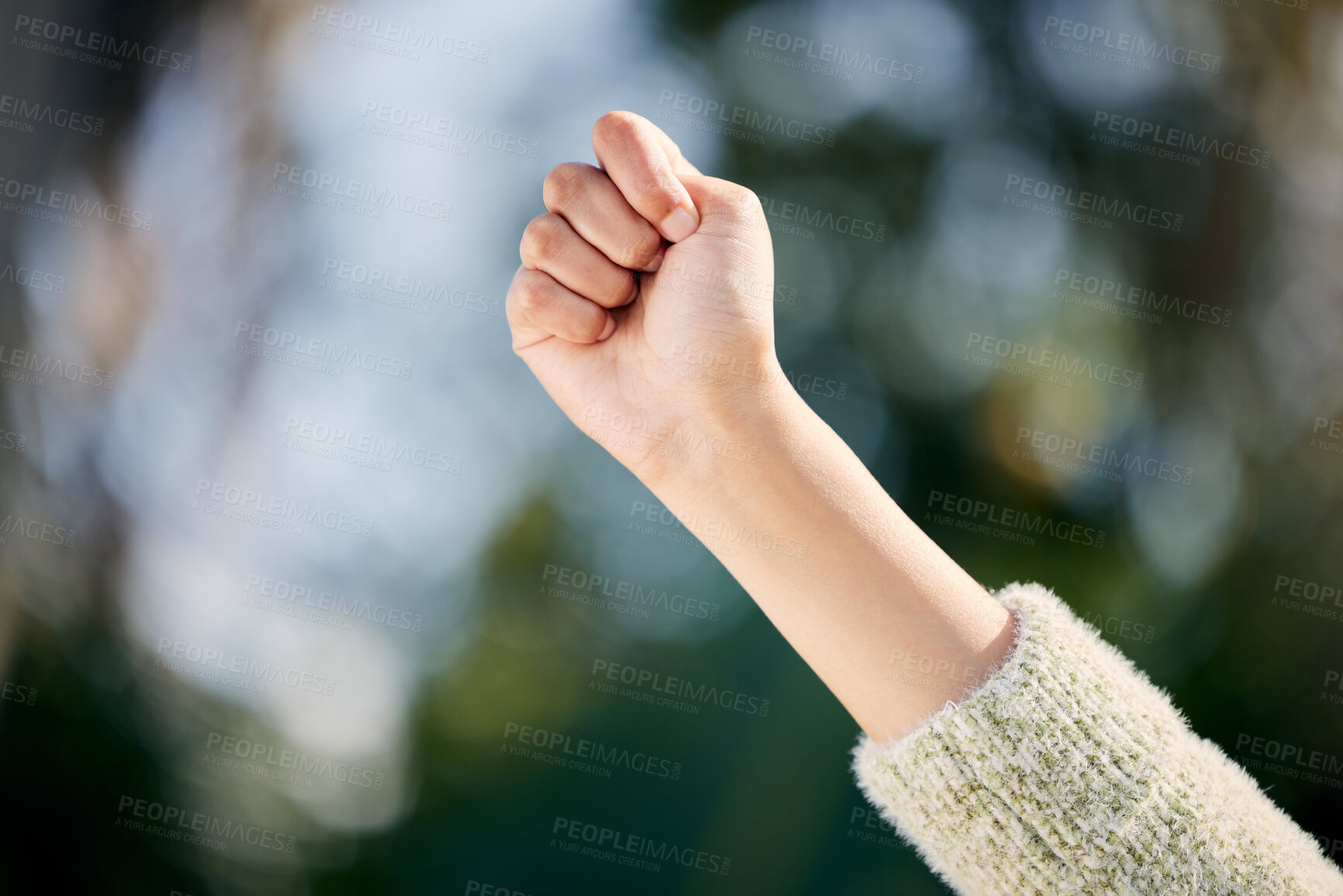 Buy stock photo Fist, hand and outside for freedom and justice, protest and rally for support and political symbol. Community, human rights and equality, empowerment and action by people for democracy and election