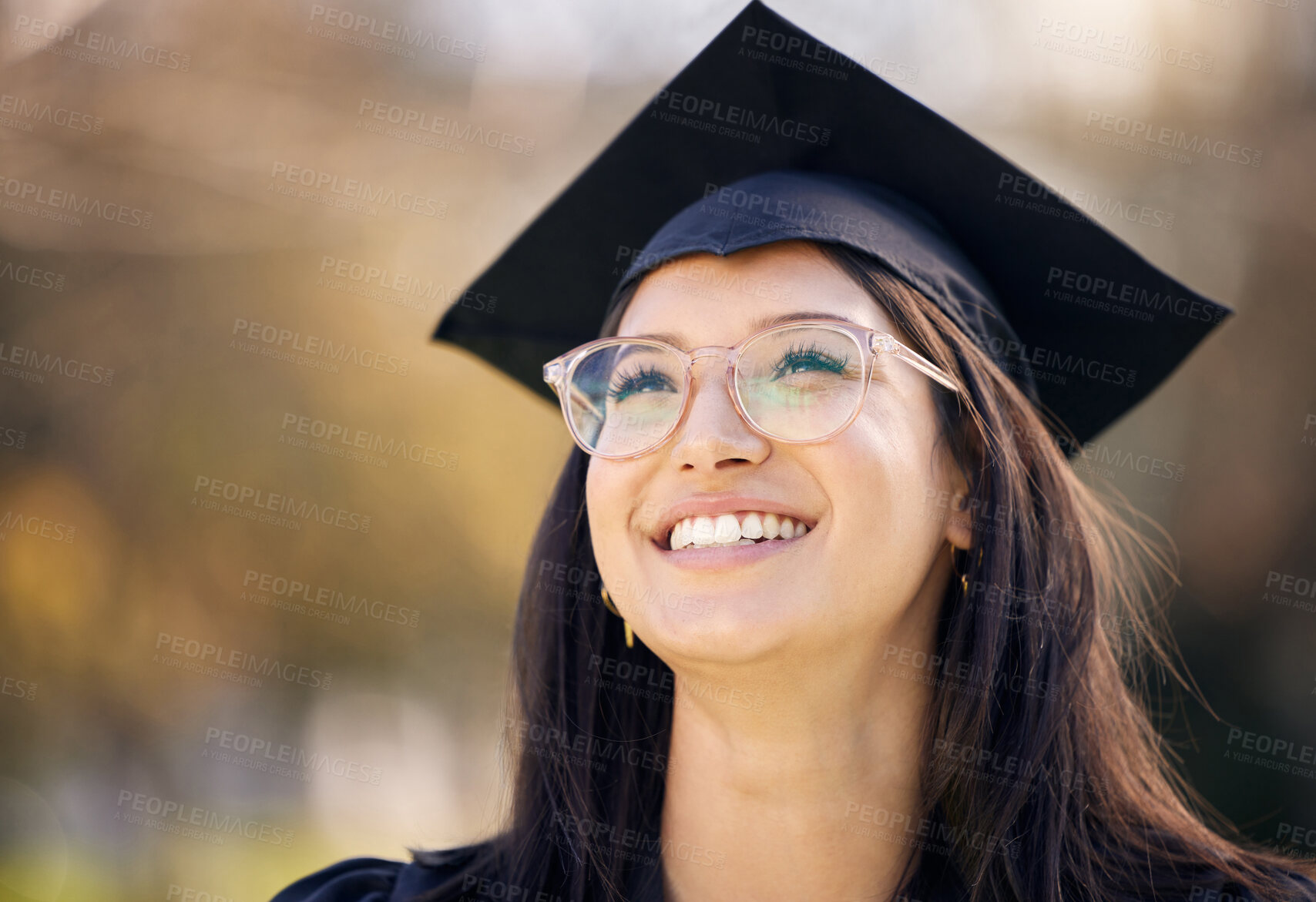 Buy stock photo University, happy and girl in nature with graduation for achievement, growth and success in education. Student, smile and thinking with pride at academy for scholarship, academic goals and knowledge