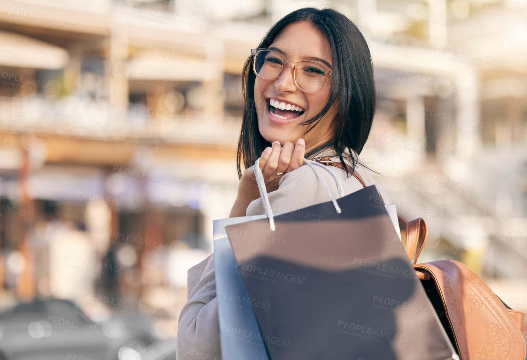 Buy stock photo Shopping, bag and portrait of woman in city excited for discount sale, promotion or luxury boutique. Laughing, girl and customer with retail deal and purchase clothes or fashion at store in New York