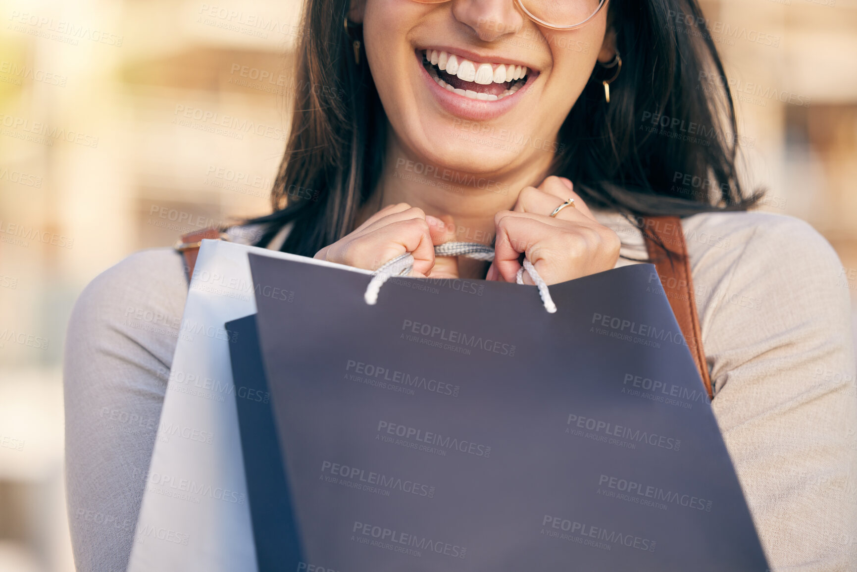 Buy stock photo Girl, customer and bag closeup shopping in city at discount sale, promotion or luxury retail store. Woman, smile and purchase at mall, boutique or buying product with offer of credit or gift