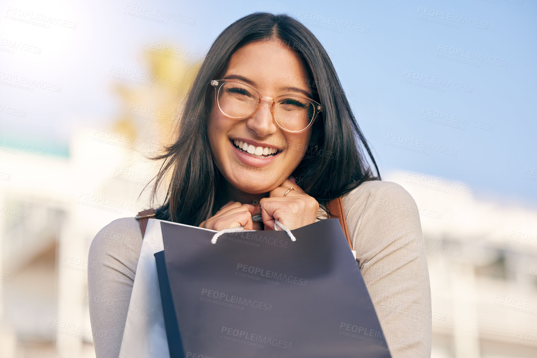 Buy stock photo Girl, shopping and portrait of customer with bag in city at discount sale, promotion or luxury retail store. Woman, smile and purchase at mall, boutique or buying product with offer of credit or gift