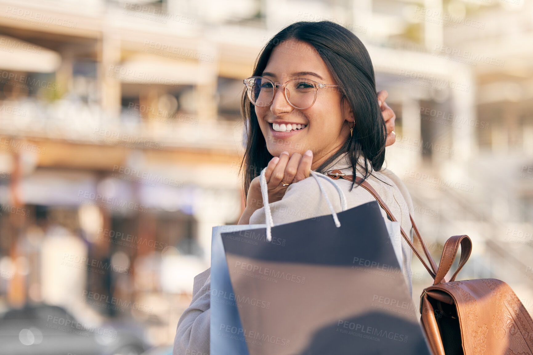 Buy stock photo Shopping, bag and portrait of woman in city excited for discount sale, promotion or luxury boutique. Happy, girl and customer with retail deal and purchase makeup, clothes or fashion from store