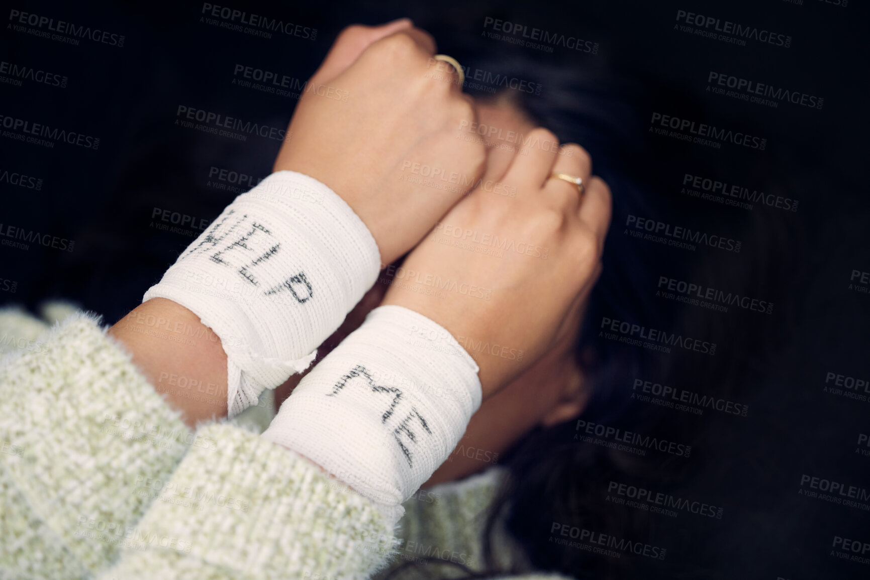 Buy stock photo Woman, depression and wrist with help on bandage for suicide, self harm or person in dark mental health crisis. Bandages, girl and injury from depressed accident, problem or mistake in cutting wrists