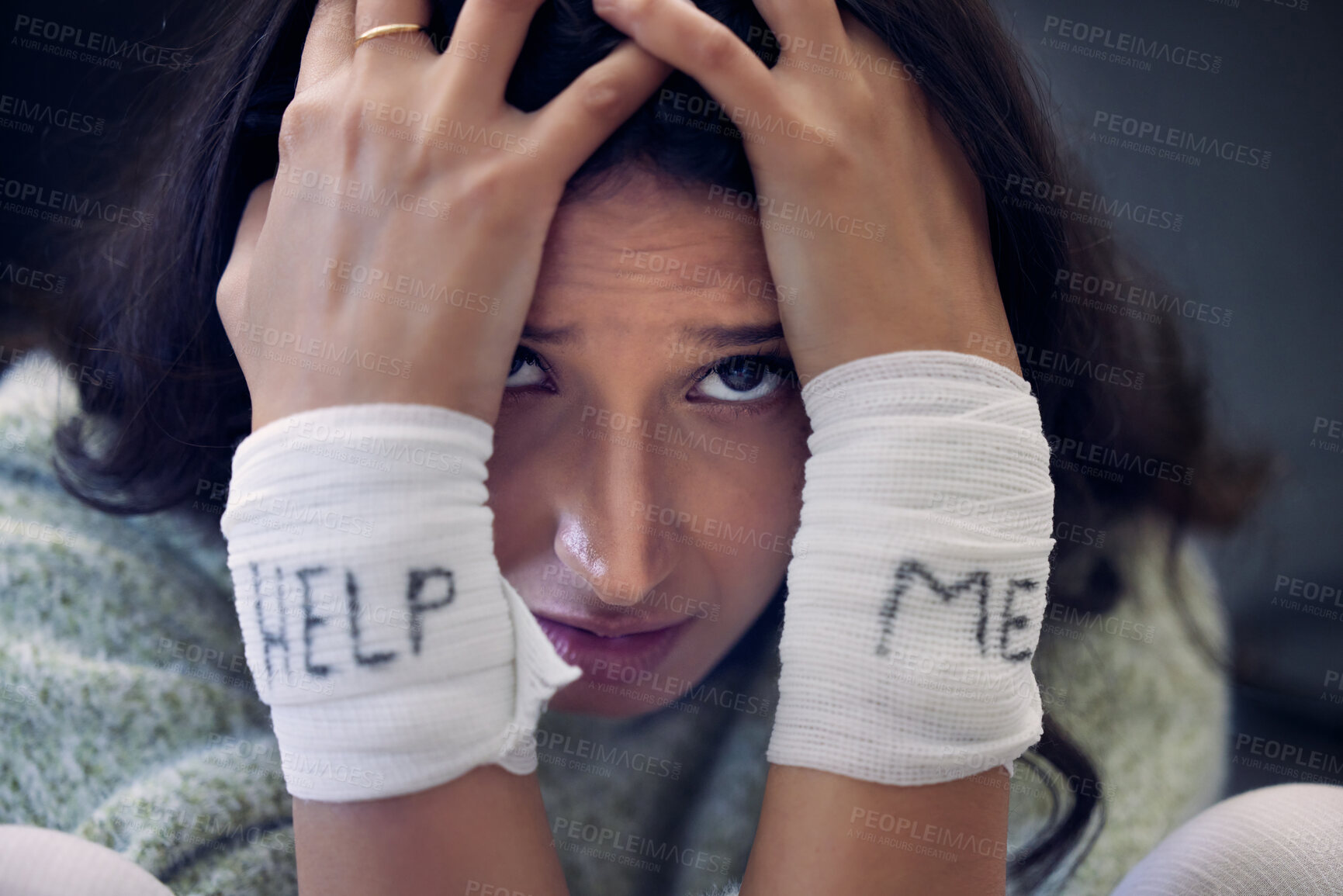 Buy stock photo Depression, wrist and woman with help on bandage for suicide, self harm or person in dark mental health crisis. Portrait, girl and injury from depressed accident, problem or mistake in cutting wrists