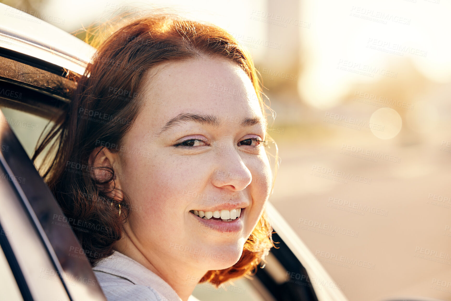 Buy stock photo Portrait of a young woman traveling in a car