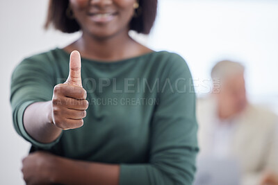 Buy stock photo Shot of an unrecognisable businesswoman showing thumbs up during a meeting in a modern office