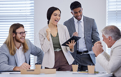 Buy stock photo Shot of a group of businesspeople cheering during a meeting in a modern office