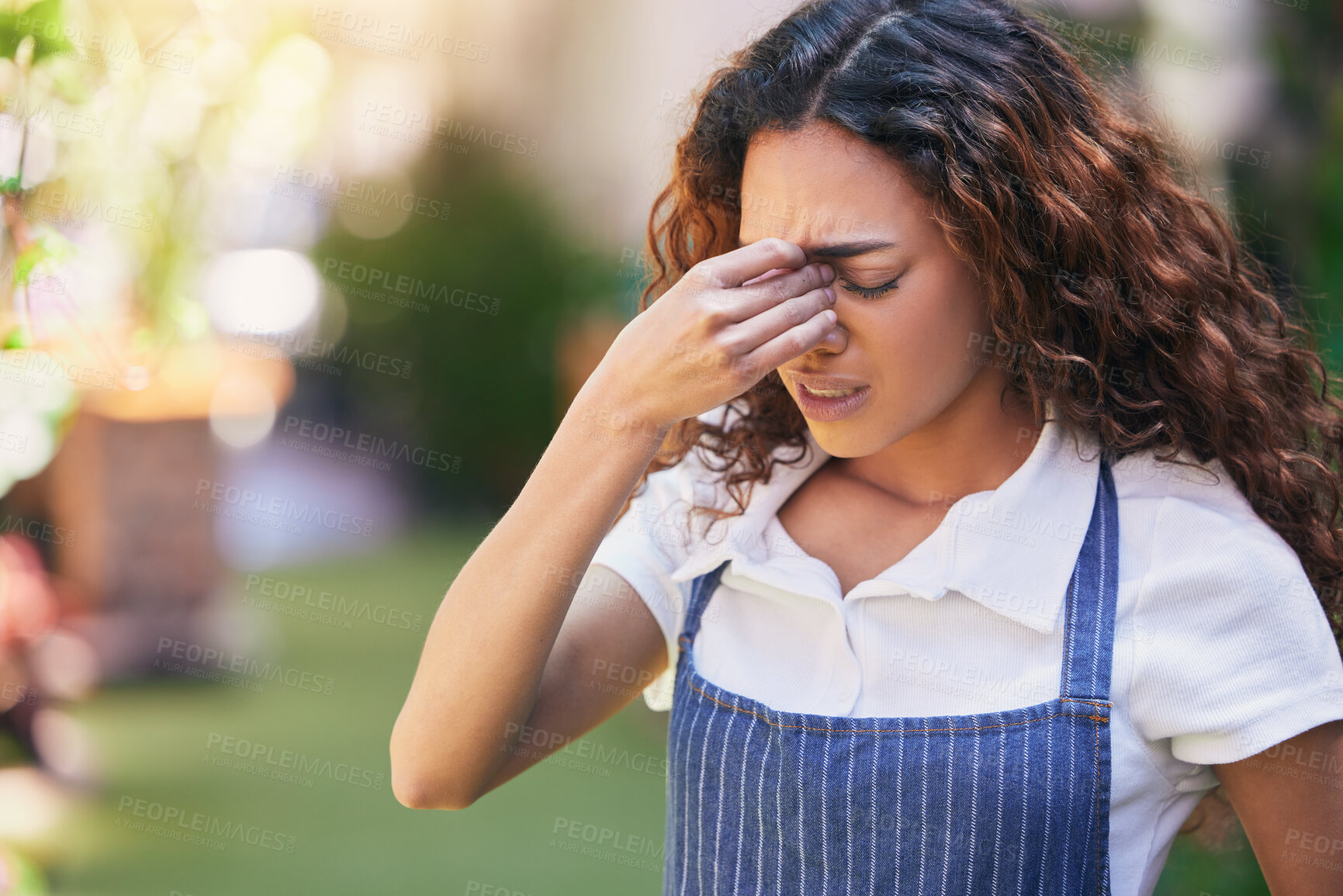 Buy stock photo Girl, gardener and tired outdoor with stress of burnout for overworked, fatigue and headache of mental exhaustion. Female florist, work pressure and overwhelmed of inventory management and working.