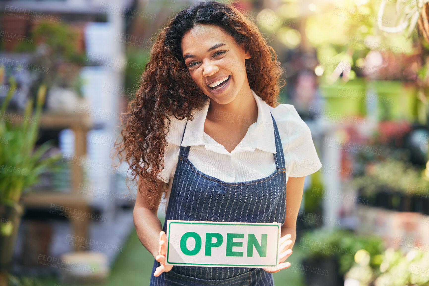 Buy stock photo Happy woman, open sign and portrait in flower shop for small business with welcome, florist service and startup. Entrepreneur girl, opening time and signage in nursery for advertising and plant store