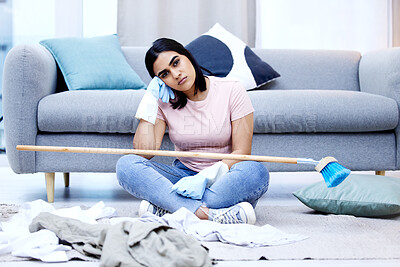 Buy stock photo Woman, bored and portrait in living room for cleaning in house with sweeping, dirty clothes and broom. Annoyed, frustrated and moody from housework in home with unhappy for duties on weekend.