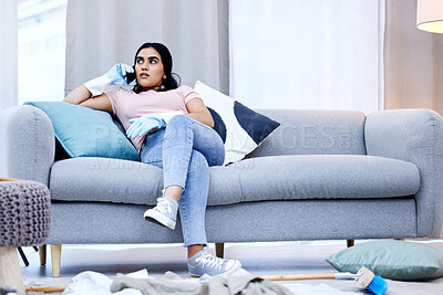 Buy stock photo Woman, phone call and relax on sofa in living room for talking, gossip and networking. Housewife, technology and delay household chores on couch for communication, conversation and connection