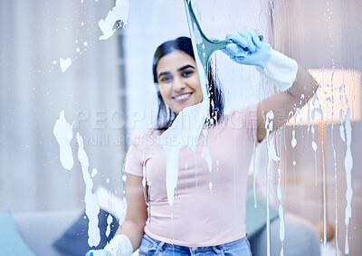 Buy stock photo Woman, smile and cleaning glass in portrait with squeegee, disinfectant and window cleaner. Soap, fluid and housework for home in lounge with antibacterial for bacteria with pride for happiness