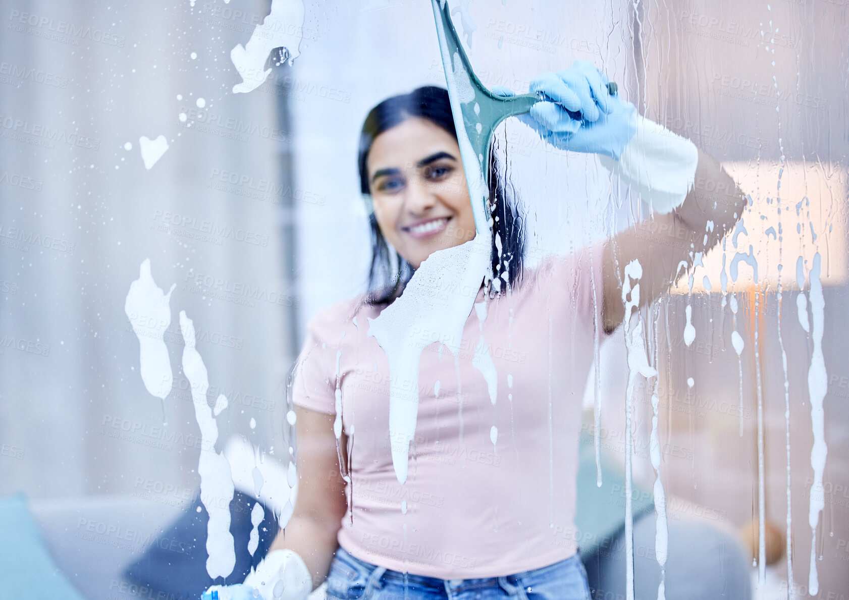 Buy stock photo Woman, smile and cleaning glass in portrait with squeegee, disinfectant and window cleaner. Soap, fluid and housework for home in lounge with antibacterial for bacteria with pride for happiness