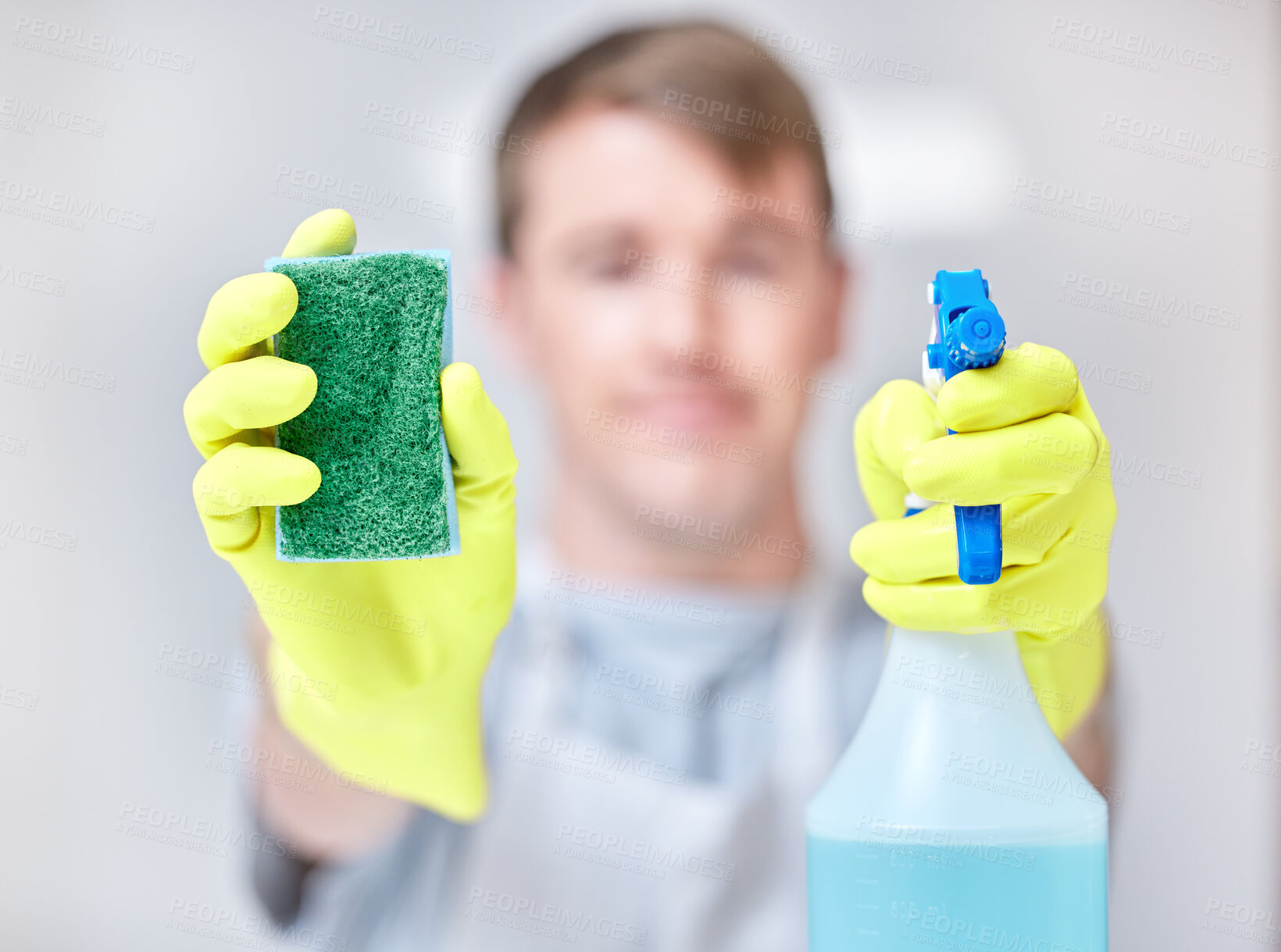 Buy stock photo Gloves, sponge and spray bottle for male cleaner, hands and safety for housekeeper. Disinfect, bacteria and germ prevention for hygiene, soap and housework for dirt and spring cleaning or washing