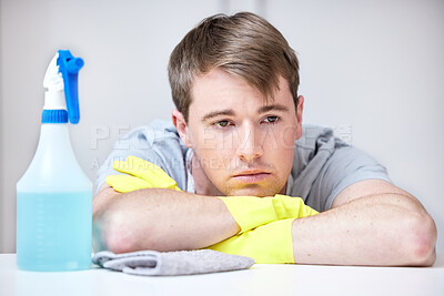 Buy stock photo Gloves, sad and spray bottle for male cleaner, hands and safety for housekeeper. Tired, overworked or annoyed worker with disinfectant for hygiene, housework or dirt and spring cleaning or washing