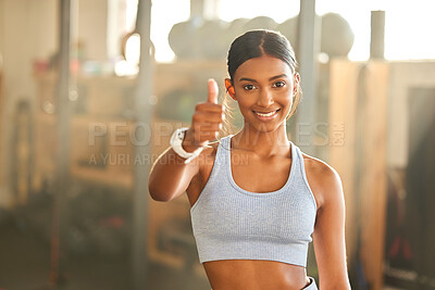 Buy stock photo Gym, portrait or Indian woman with thumbs up in fitness training with positive mindset or motivation. Encouragement, support or happy personal trainer in workout with like hand sign or thumb up 