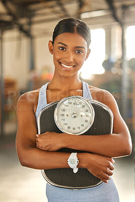 Buy stock photo Fitness, portrait or happy Indian woman with scale after body training or gym workout to lose weight. Wellness, personal trainer or sports girl athlete in health club for exercising progress results