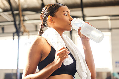 Buy stock photo Relax, fitness or Indian woman drinking water in gym after training, workout or exercise to hydrate her body. Fatigue, wellness or tired girl with bottle for healthy liquid hydration on resting break