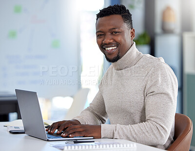 Buy stock photo Portrait, office and black man typing on laptop at creative startup company for email, project or report. Face, computer and happy entrepreneur, business employee and accountant at desk in Nigeria