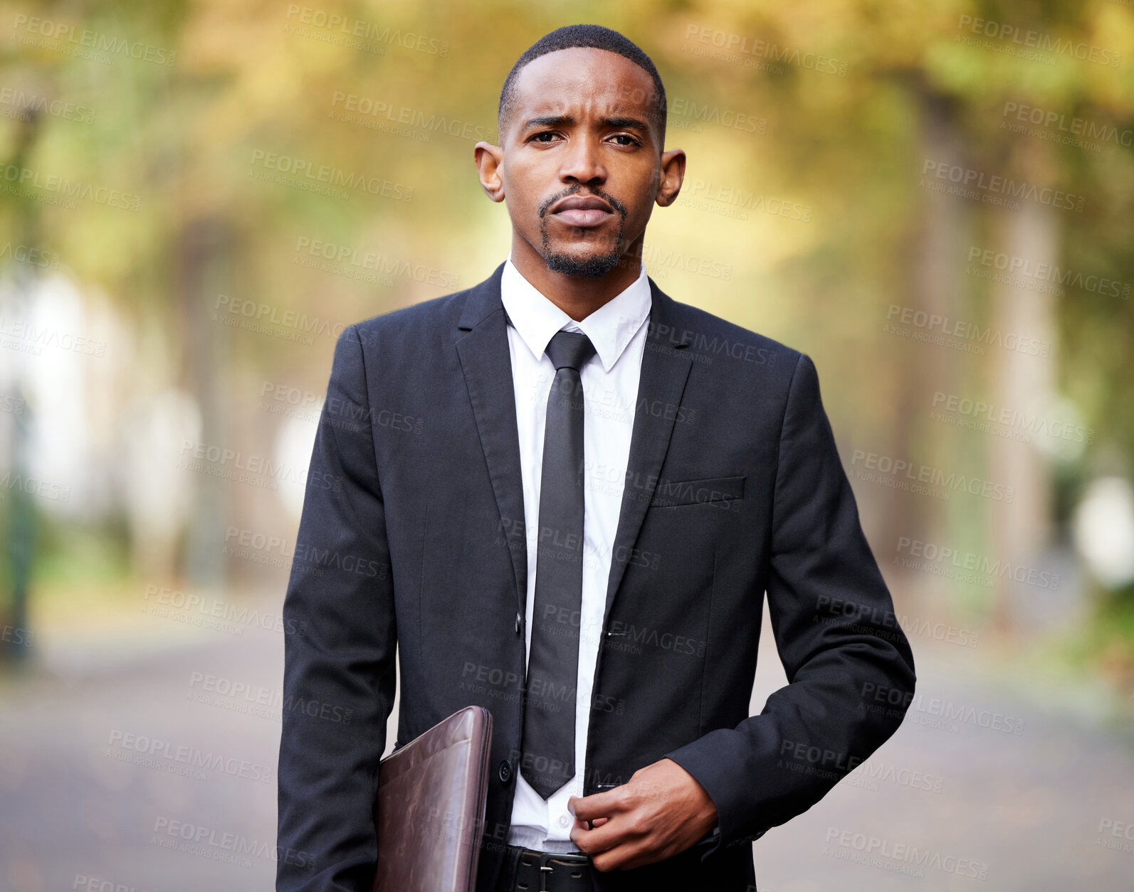 Buy stock photo Business, portrait and lawyer black man in park with documents ready for legal case or trial. Confident, legislation and serious attorney in suit for defense council, prosecution or representation