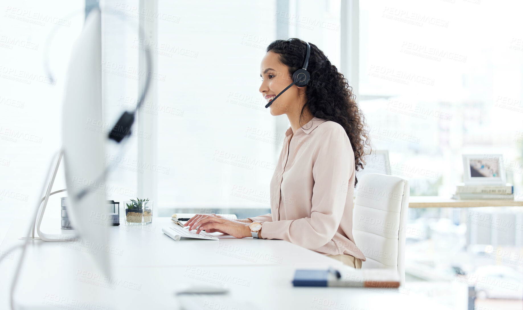 Buy stock photo Call center, computer and happy consultant woman in telemarketing office for online assistance or help. Contact us, desk and microphone with sales agent or operator in workplace for customer support