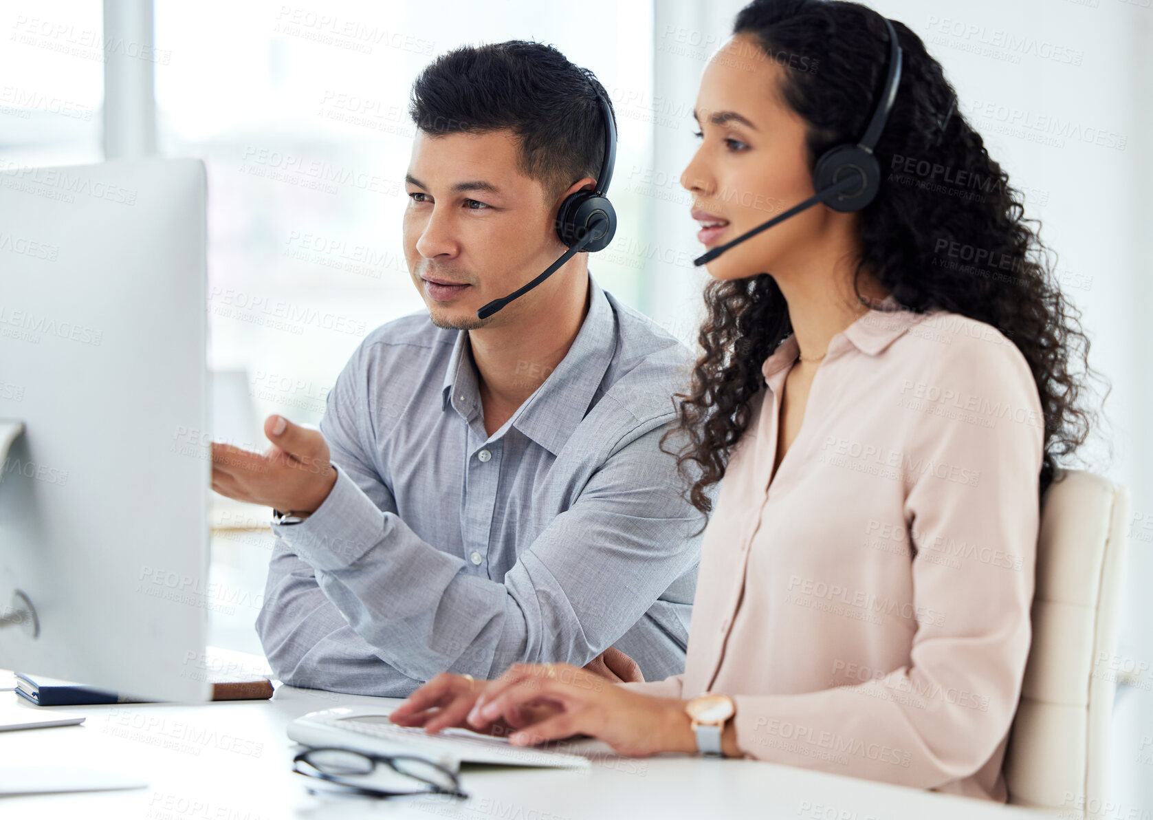 Buy stock photo Call centre, man and woman with manager, typing and computer for website and market research online. Tech support, help and customer service with headset or headphones, training and communication