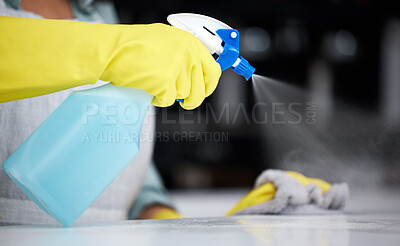 Buy stock photo Person, hands and cleaner with spray bottle for table, kitchen counter or dirty furniture in home. Wellness, maid and janitor washing a messy surface with product, liquid soap and cloth with gloves