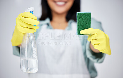 Buy stock photo Person, hands and cleaner with spray bottle or sponge for kitchen counter or dirty furniture in studio. Grey background, maid or janitor ready to start washing with product, liquid soap or gloves