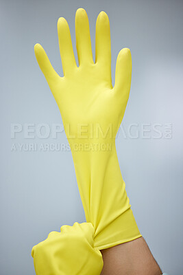 Buy stock photo Hands, cleaning and rubber gloves for safety or hygiene while indoor for chores or housework as a maid. Bacteria, service and latex with a cleaner or janitor getting ready for housekeeping duties
