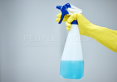Buy stock photo Person, chemical or hands of cleaner with spray bottle for wellness, bacteria germs or cleaning in studio. Grey background, maid or closeup of janitor washing mess with product, liquid soap or gloves
