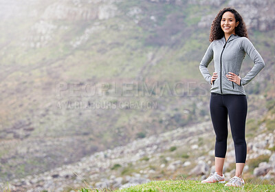 Buy stock photo Shot of a fit young woman out in the mountains for a workout