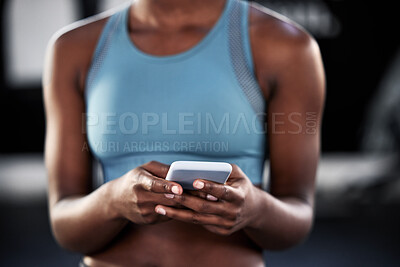 Buy stock photo Smartphone, hands or woman in gym on social media to relax on fitness or exercise or workout break. Athlete closeup, texting or girl with mobile app for online digital communication after training