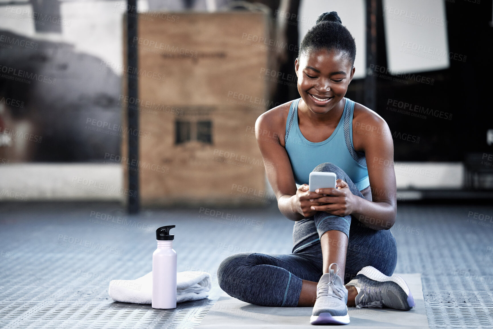 Buy stock photo Smartphone, happy or black woman in gym on social media to relax on fitness or exercise or workout break. Athlete, meme or funny girl with mobile app for online digital communication after training