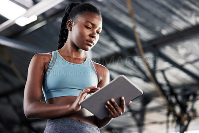 Buy stock photo Black woman, planning or personal trainer with a tablet for fitness training, workout or sports exercise. Progress results, digital technology app or gym instructor typing an online coaching schedule