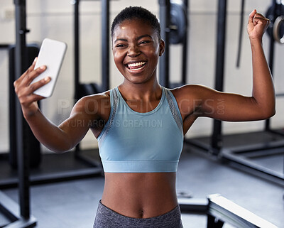 Buy stock photo Gym, flexing or happy girl taking selfie on workout, exercise or training break on social media for results. Proud influencer, strong or black woman smiling for pictures or online fitness content 