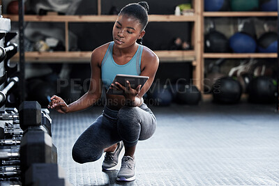 Buy stock photo Girl, inspection or personal trainer with a tablet for fitness training dumbbells or workout tools for exercise. Black woman, digital or African manager checking gym equipment, weights or inventory