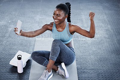 Buy stock photo Gym, fitness or happy black woman taking selfie on workout, exercise or training break on social media. Wellness, smile or healthy African girl flexing, relaxing or taking pictures for online content