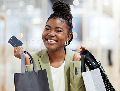 Buy stock photo Black woman, portrait and shopping bag with credit card for payment, discount or sale at retail store or mall. Face of happy African female person or shopper smile with gift bags, product or purchase