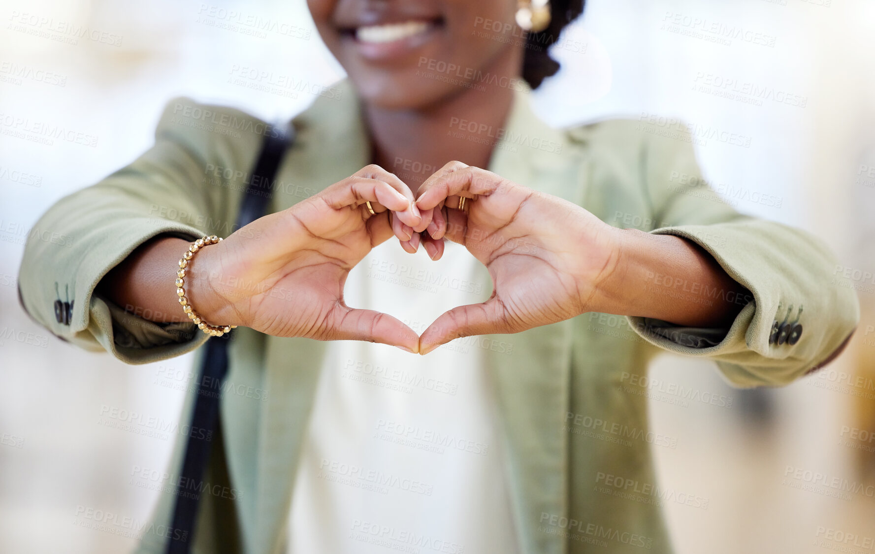 Buy stock photo Black woman, business and hands with heart in office for gratitude, support and compassion for company goal. African female employee, corporate and love emoji or icon for kindness, hope and empathy