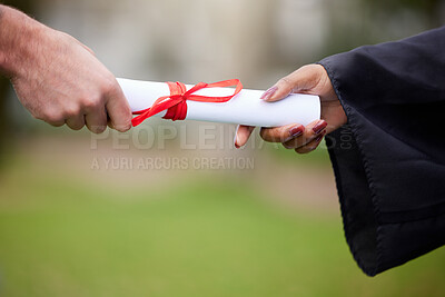 Buy stock photo Closeup shot of an unrecognisable graduate receiving their certificate on graduation day