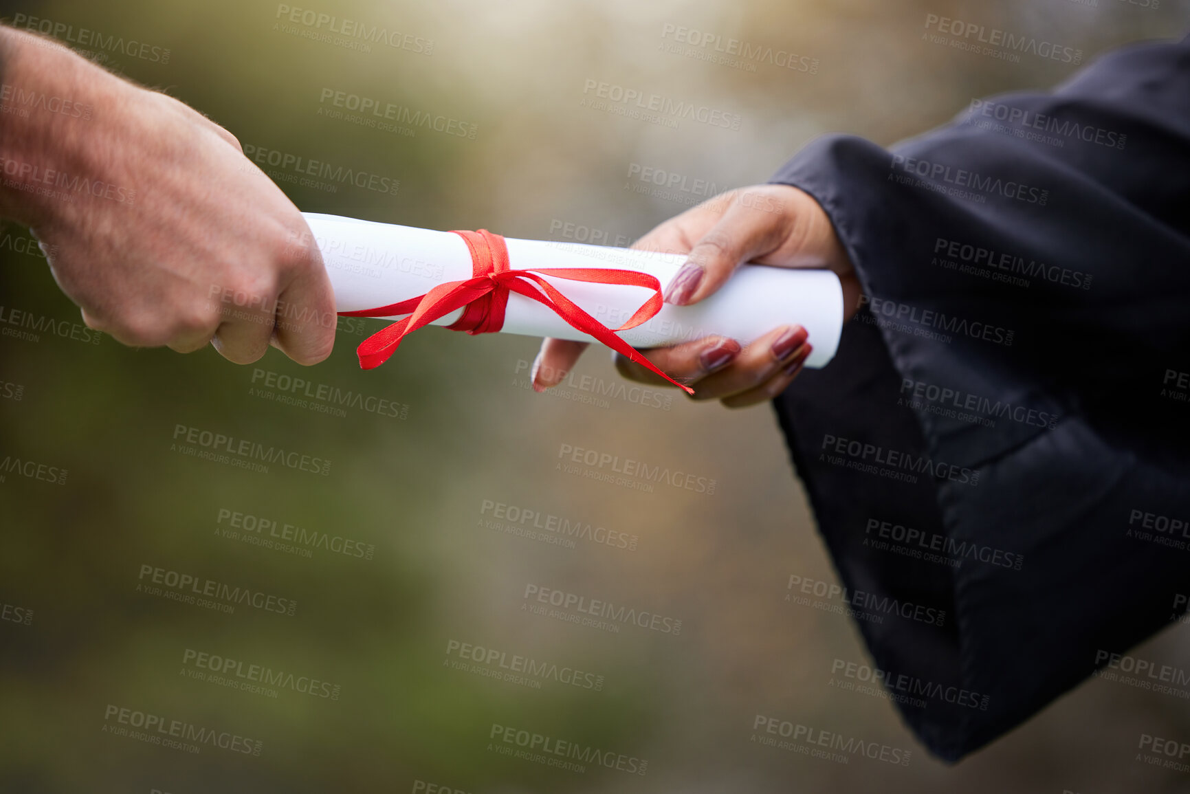 Buy stock photo Closeup shot of an unrecognisable graduate receiving their certificate on graduation day