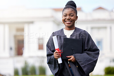 Buy stock photo Portrait of a young woman holding a certificate and cap on graduation day