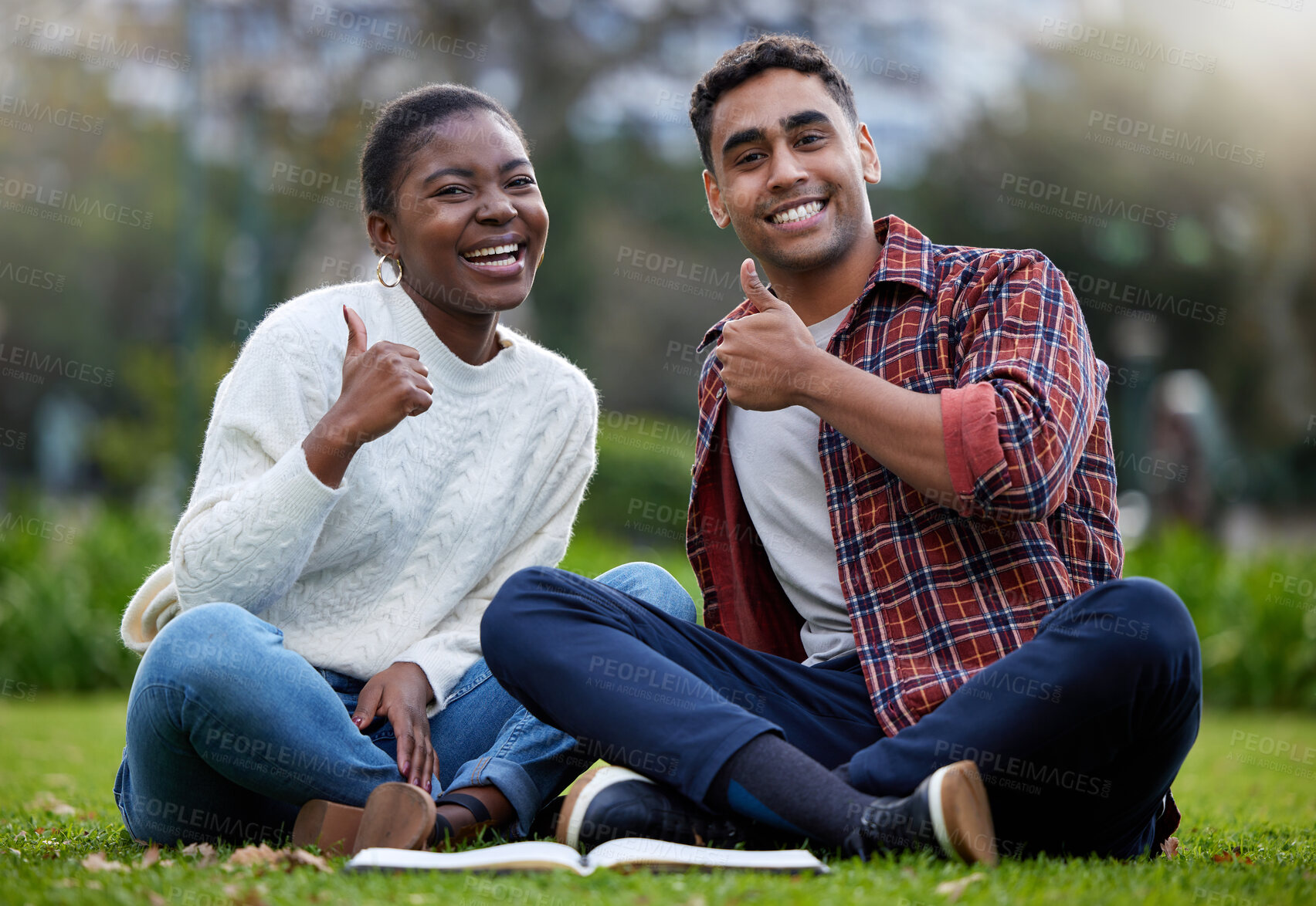 Buy stock photo Portrait, students and friends with thumbs up, grass or relax with education, icon or promotion for university. Face, smile and man with woman in park, hand gesture or like with symbol, agree or sign