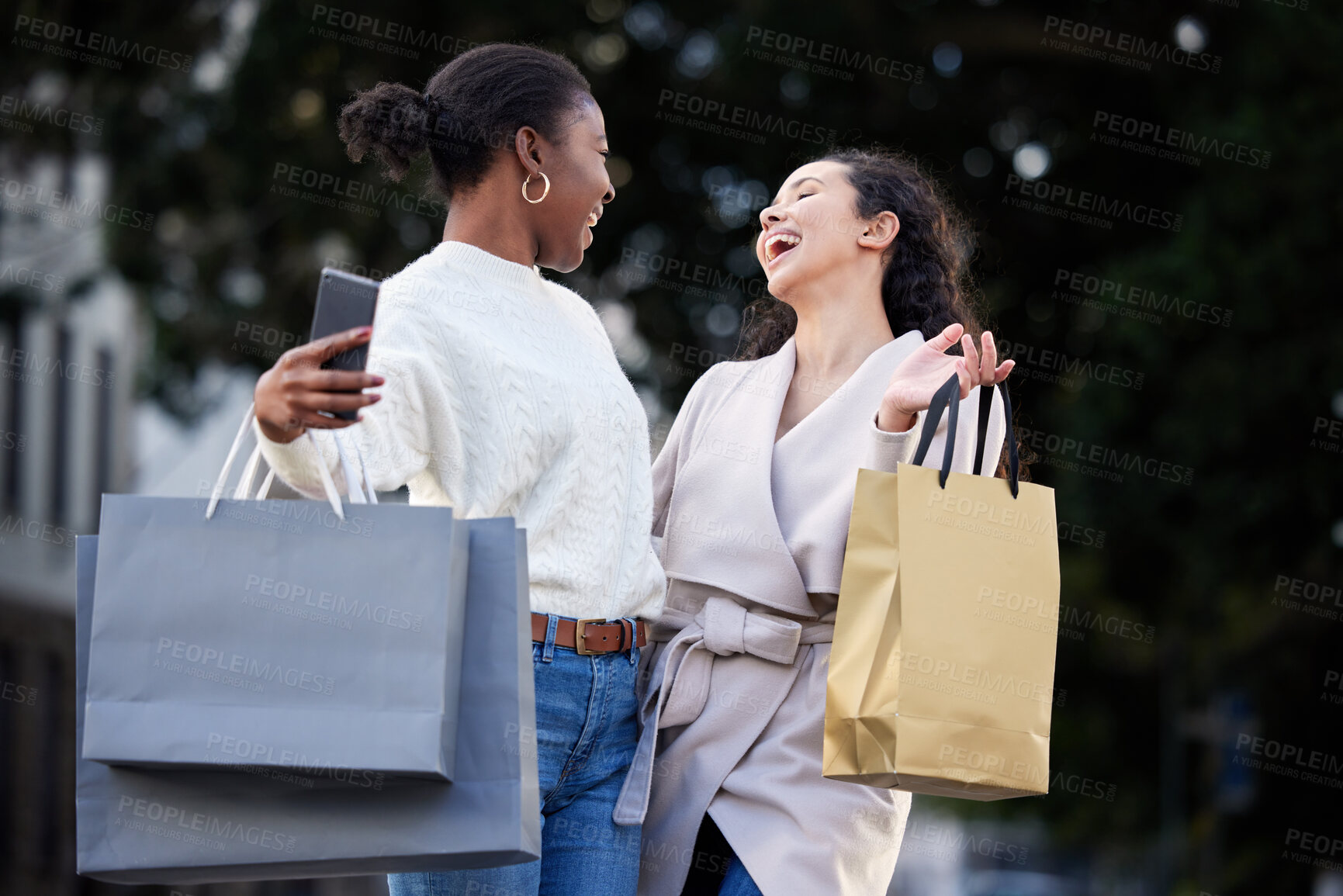 Buy stock photo Woman, shopping bag and laugh with smartphone in city, online sales and friends happy or smile for retail deal. Discount, technology and urban down town, fashion and research on social media app